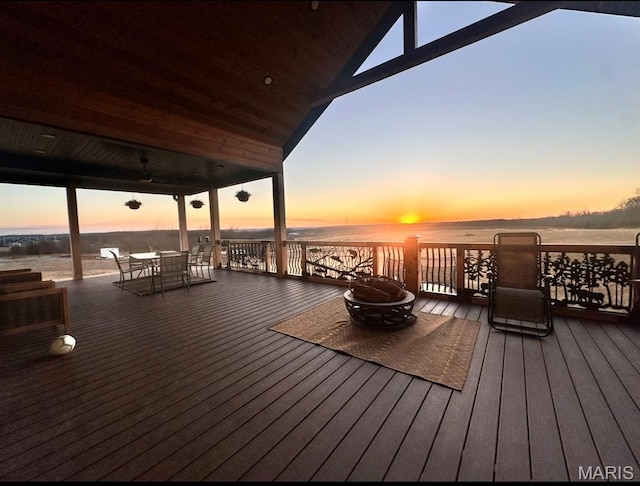 14005 Osage Dr, New London, MO 63459 - deck featuring a fire pit, outdoor dining space, ceiling fan, and a water view