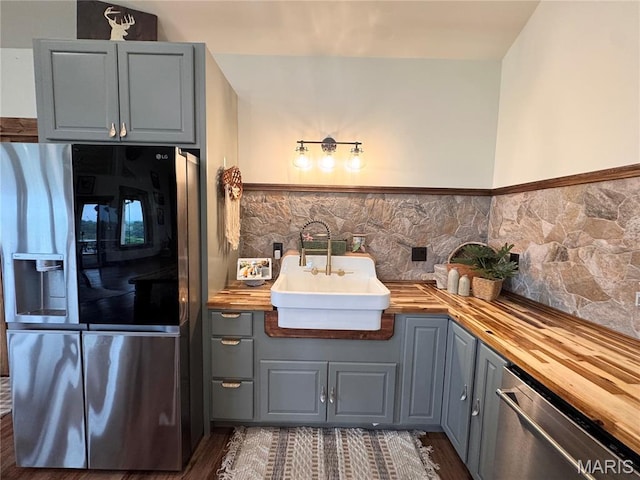 14005 Osage Dr, New London, MO 63459 - bathroom featuring a sink and wood finished floors