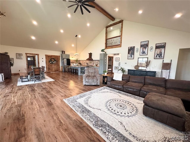 14005 Osage Dr, New London, MO 63459 - living room featuring high vaulted ceiling, ceiling fan, dark wood-type flooring, and beamed ceiling