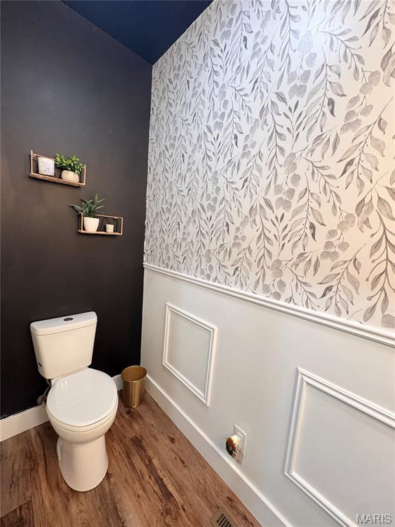 14005 Osage Dr, New London, MO 63459 - bathroom featuring wood finished floors and toilet