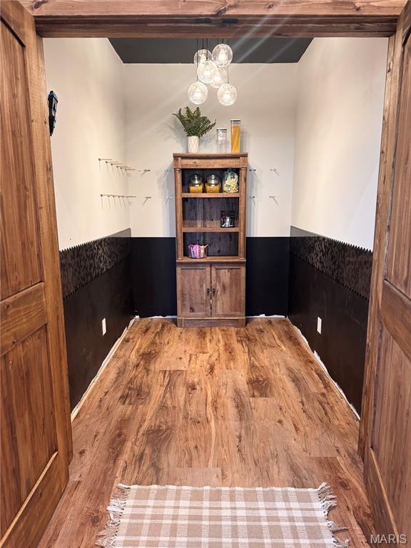 14005 Osage Dr, New London, MO 63459 - dining area with wood finished floors and a chandelier