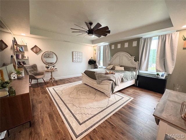 14005 Osage Dr, New London, MO 63459 - bedroom featuring a tray ceiling, wood finished floors, a ceiling fan, and recessed lighting