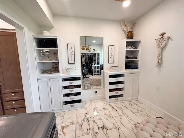14005 Osage Dr, New London, MO 63459 - spacious closet featuring light marble finish flooring