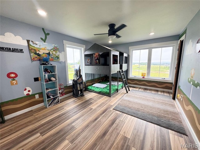 14005 Osage Dr, New London, MO 63459 - bedroom with wood finished floors, ceiling fan, and recessed lighting