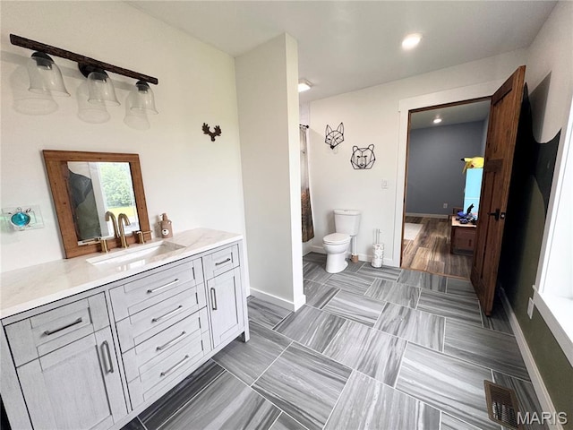 14005 Osage Dr, New London, MO 63459 - bathroom with vanity, curtained shower, and recessed lighting