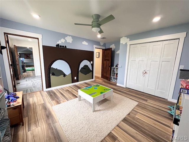 14005 Osage Dr, New London, MO 63459 - recreation room with a ceiling fan and wood finished floors