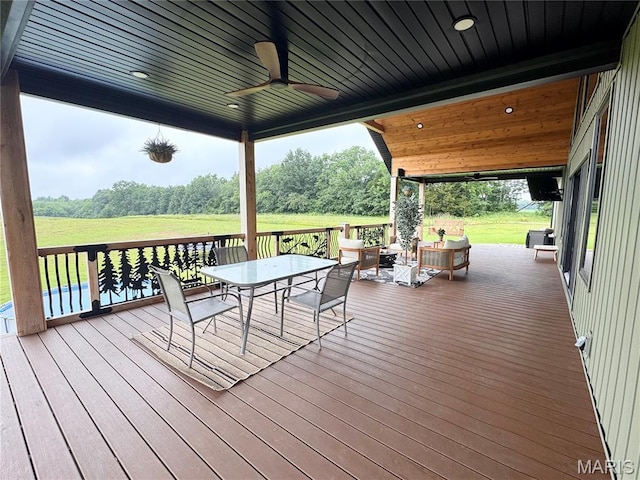14005 Osage Dr, New London, MO 63459 - wooden terrace featuring a ceiling fan and outdoor dining space
