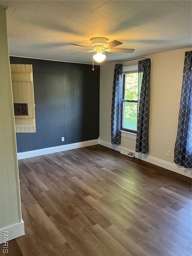 1032 W Pearl St, Staunton, IL 62088 - unfurnished room featuring a ceiling fan and wood finished floors