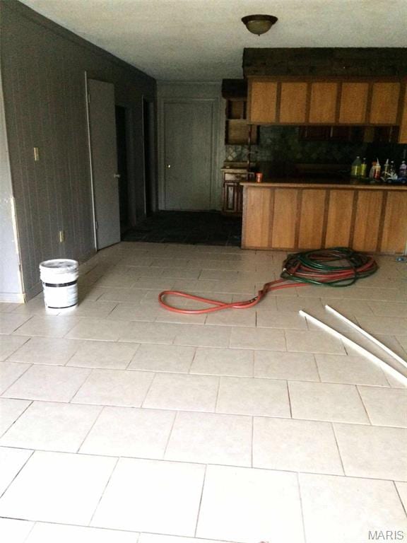 2794 US Highway 160, Doniphan, MO 63935 - kitchen with light tile patterned flooring and brown cabinets