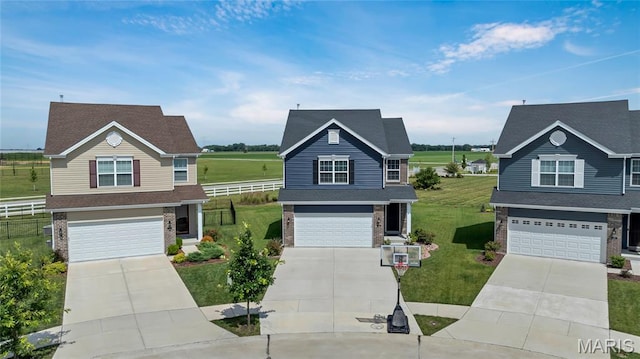 130 Baycrest Ct, Saint Charles, MO 63301 - traditional-style home featuring brick siding, an attached garage, and driveway
