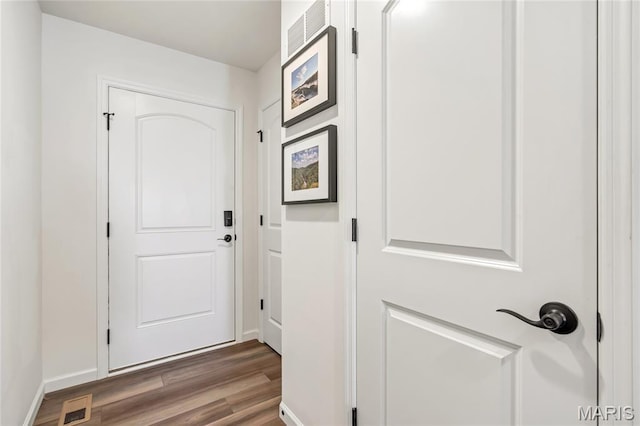 130 Baycrest Ct, Saint Charles, MO 63301 - doorway to outside featuring wood finished floors and baseboards