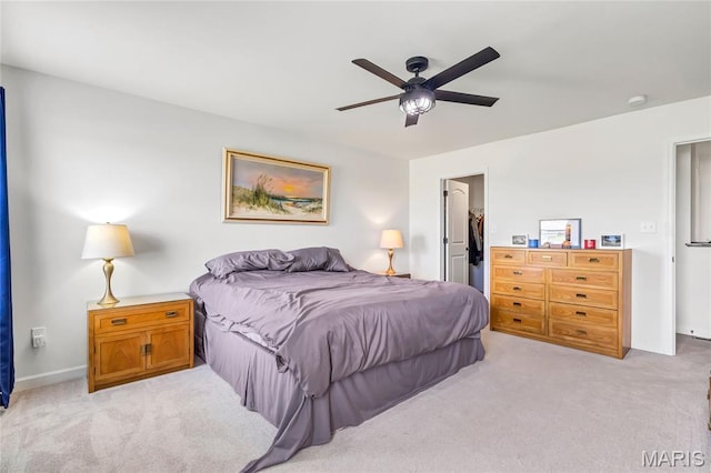 130 Baycrest Ct, Saint Charles, MO 63301 - bedroom featuring light carpet, a spacious closet, a ceiling fan, and a closet