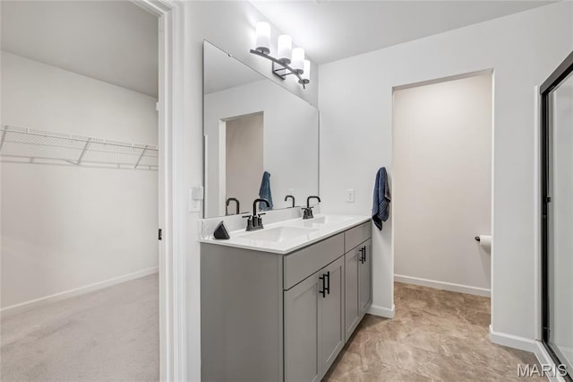 130 Baycrest Ct, Saint Charles, MO 63301 - bathroom with double vanity and a walk in closet