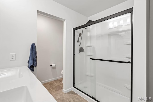130 Baycrest Ct, Saint Charles, MO 63301 - bathroom featuring a stall shower and toilet