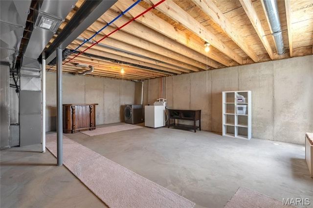 130 Baycrest Ct, Saint Charles, MO 63301 - unfinished below grade area featuring washer and clothes dryer and heating unit