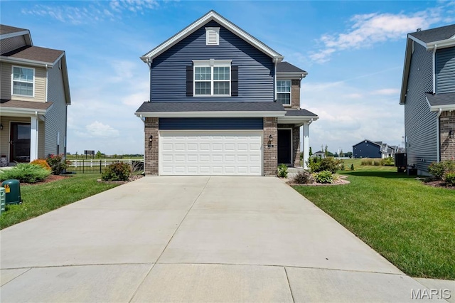 130 Baycrest Ct, Saint Charles, MO 63301 - view of front of property featuring brick siding, an attached garage, a front lawn, and driveway