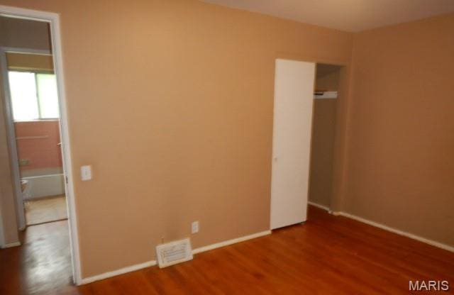 10246 Dacey Dr, Saint Louis, MO 63136 - unfurnished bedroom with wood finished floors