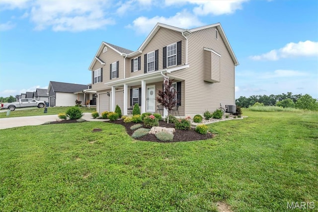 1424 Cortez Dr, Hillsboro, MO 63050 - traditional home with a garage, a front yard, driveway, and covered porch