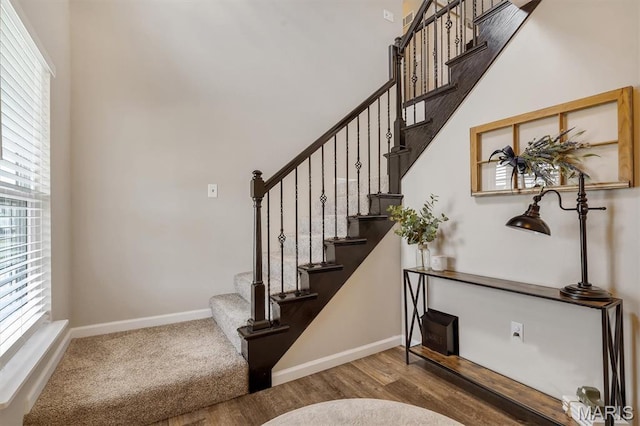 1424 Cortez Dr, Hillsboro, MO 63050 - stairs with baseboards and wood finished floors