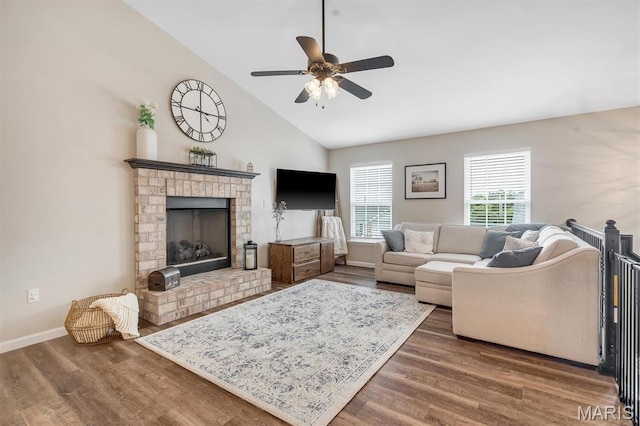 1424 Cortez Dr, Hillsboro, MO 63050 - living area with a ceiling fan, a brick fireplace, wood finished floors, and vaulted ceiling