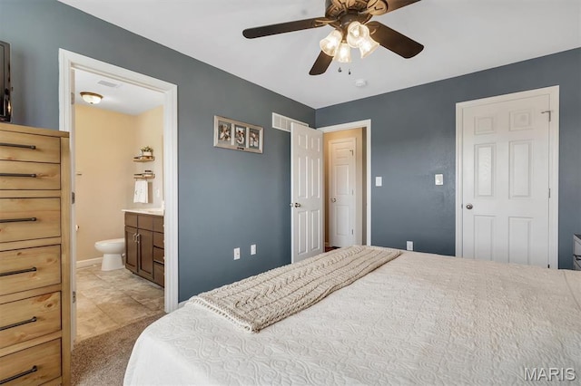 1424 Cortez Dr, Hillsboro, MO 63050 - bedroom with ensuite bath and a ceiling fan