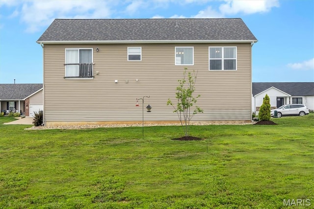 1424 Cortez Dr, Hillsboro, MO 63050 - rear view of house with a lawn