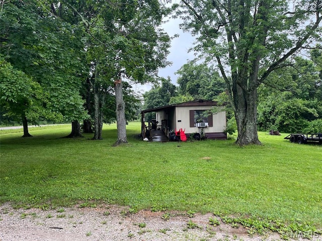 13688 State Highway U, Mineral Point, MO 63660 - view of green lawn featuring an outbuilding