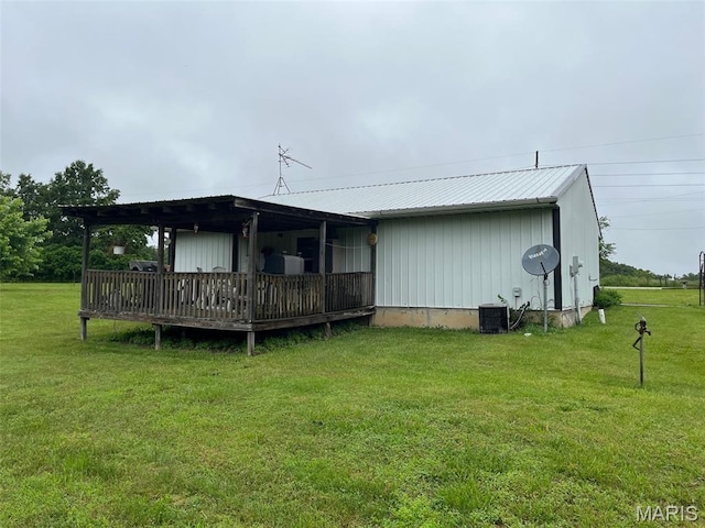 13688 State Highway U, Mineral Point, MO 63660 - rear view of property with a yard, a wooden deck, and a metal roof