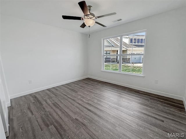 9 Sonata Ln, Troy, IL 62294 - unfurnished room with dark wood-style floors and ceiling fan