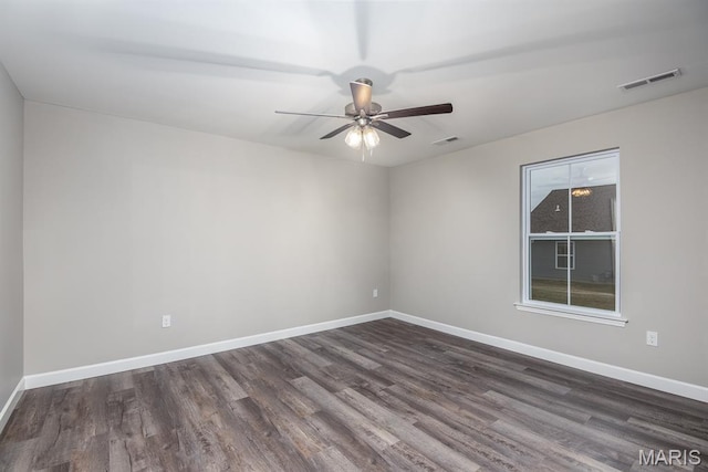 9 Sonata Ln, Troy, IL 62294 - empty room featuring dark wood finished floors and a ceiling fan