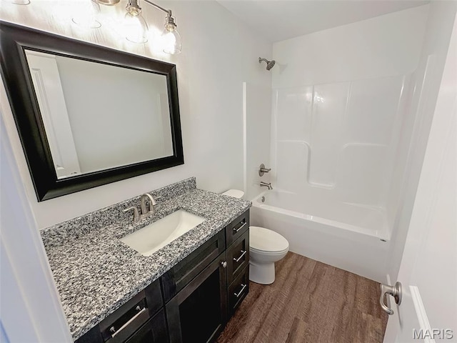 9 Sonata Ln, Troy, IL 62294 - full bath featuring wood finished floors, vanity, and washtub / shower combination