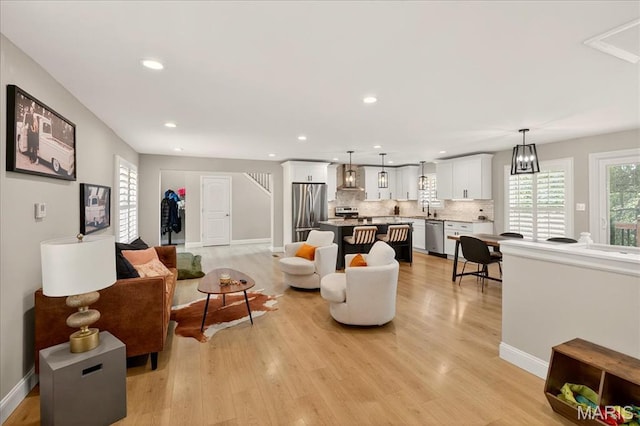 6521 Woodland Dr, Cedar Hill, MO 63016 - living room with light wood-type flooring and recessed lighting