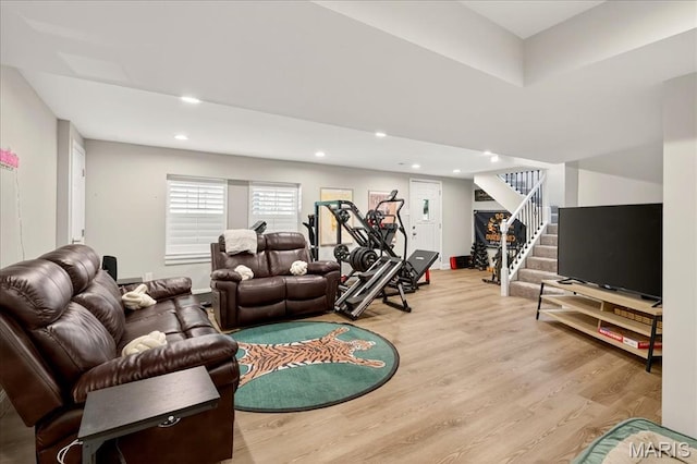 6521 Woodland Dr, Cedar Hill, MO 63016 - living room featuring wood finished floors, recessed lighting, and stairs