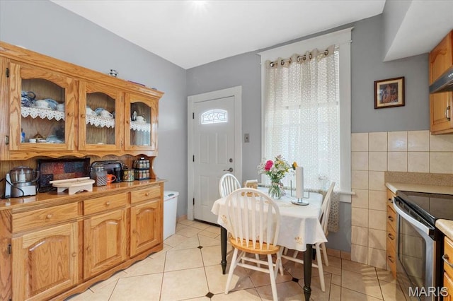 5140 Christy Ave, Saint Louis, MO 63116 - dining space with light tile patterned floors