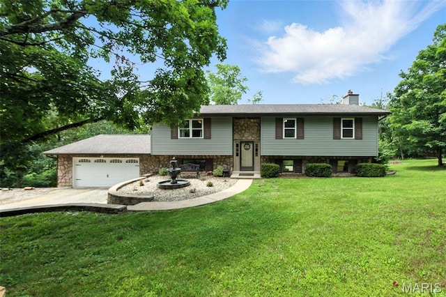 4472 Liberty Ridge Rd, De Soto, MO 63020 - raised ranch with a garage, a chimney, stone siding, a front lawn, and concrete driveway
