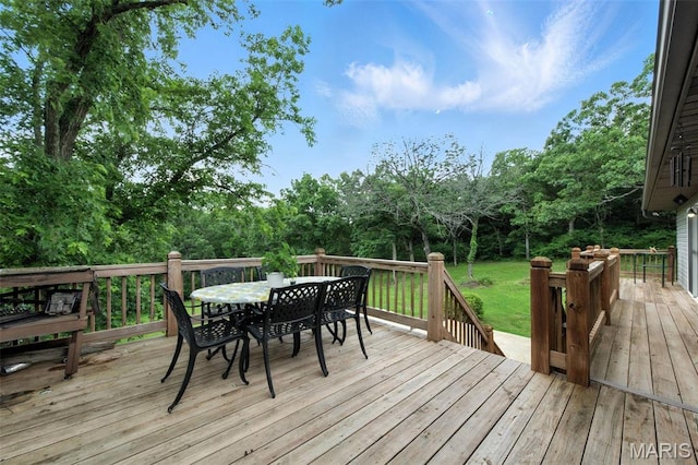 4472 Liberty Ridge Rd, De Soto, MO 63020 - wooden terrace featuring outdoor dining space and a lawn