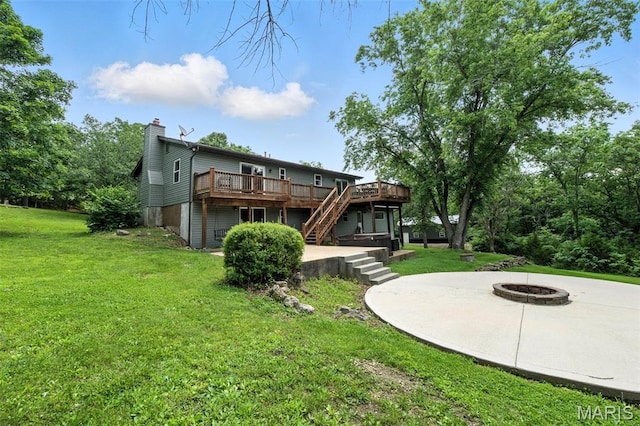 4472 Liberty Ridge Rd, De Soto, MO 63020 - rear view of property featuring a fire pit, a wooden deck, stairs, and a yard