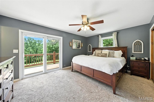 4472 Liberty Ridge Rd, De Soto, MO 63020 - bedroom with access to exterior, light colored carpet, and a ceiling fan