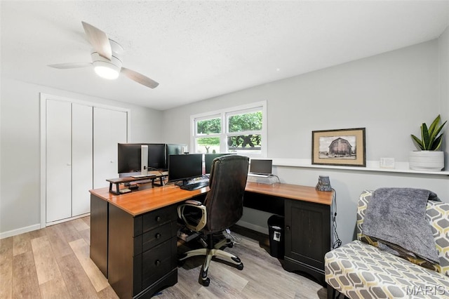 4472 Liberty Ridge Rd, De Soto, MO 63020 - home office featuring light wood-style floors and a ceiling fan