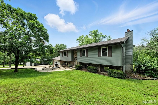 4472 Liberty Ridge Rd, De Soto, MO 63020 - rear view of property featuring a yard and a chimney