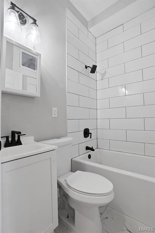 2205 S 11th St, Saint Louis, MO 63104 - bathroom with marble finish floors, vanity, and bathtub / shower combination