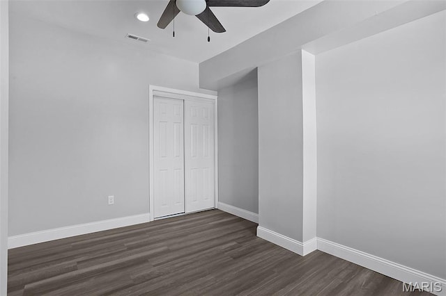 2205 S 11th St, Saint Louis, MO 63104 - unfurnished bedroom featuring dark wood-style floors, a closet, a ceiling fan, and recessed lighting