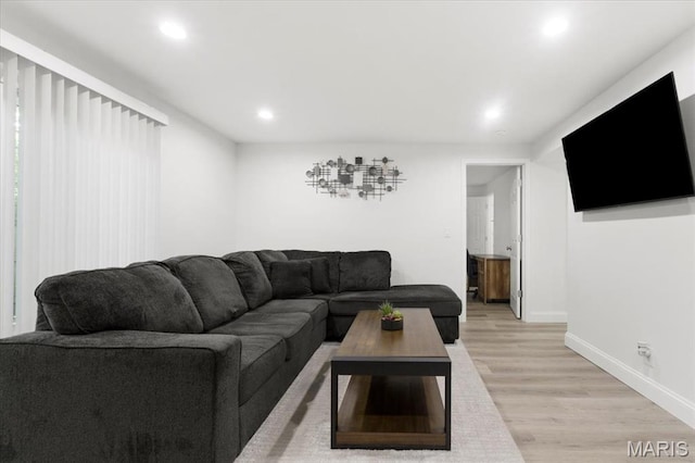 10401 Briarbend Dr Unit 2, Saint Louis, MO 63146 - living area featuring light wood-style flooring and recessed lighting