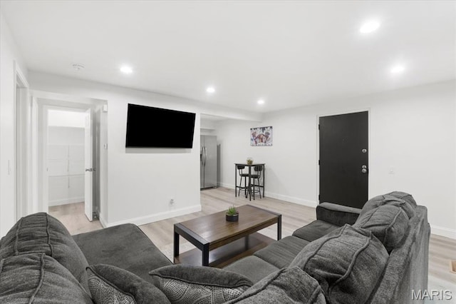 10401 Briarbend Dr Unit 2, Saint Louis, MO 63146 - living area featuring recessed lighting and light wood-style flooring