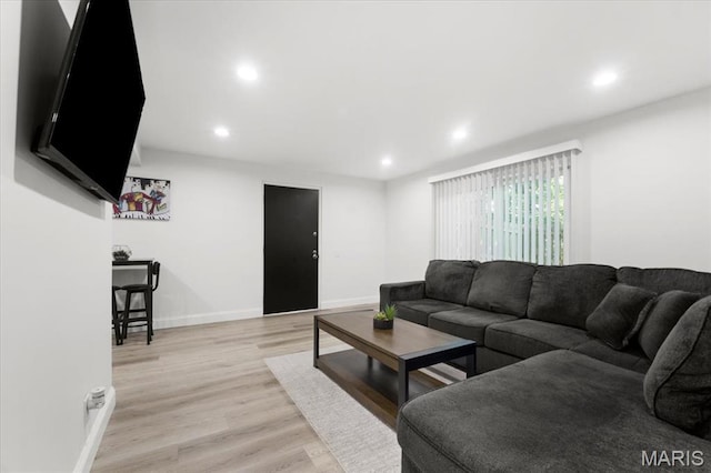 10401 Briarbend Dr Unit 2, Saint Louis, MO 63146 - living area with recessed lighting and light wood finished floors