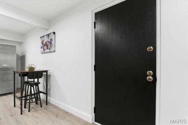 10401 Briarbend Dr Unit 2, Saint Louis, MO 63146 - hallway featuring wood finished floors and baseboards