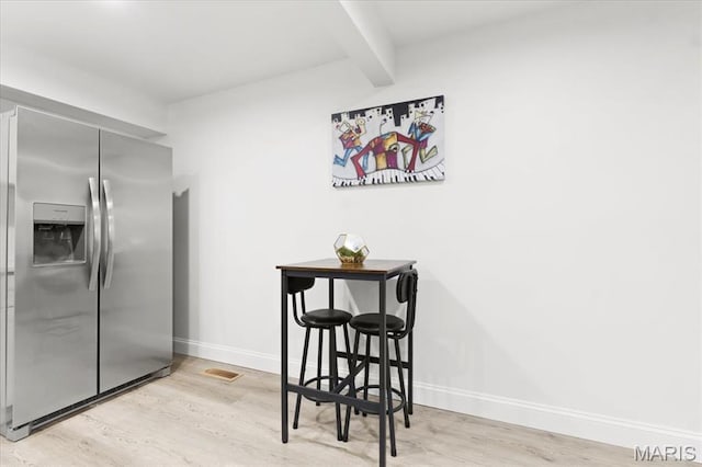 10401 Briarbend Dr Unit 2, Saint Louis, MO 63146 - dining area featuring wood finished floors and baseboards