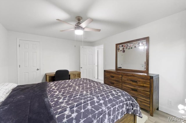 10401 Briarbend Dr Unit 2, Saint Louis, MO 63146 - bedroom with wood finished floors and a ceiling fan