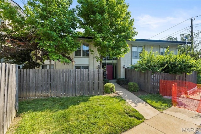 10401 Briarbend Dr Unit 2, Saint Louis, MO 63146 - obstructed view of property featuring brick siding
