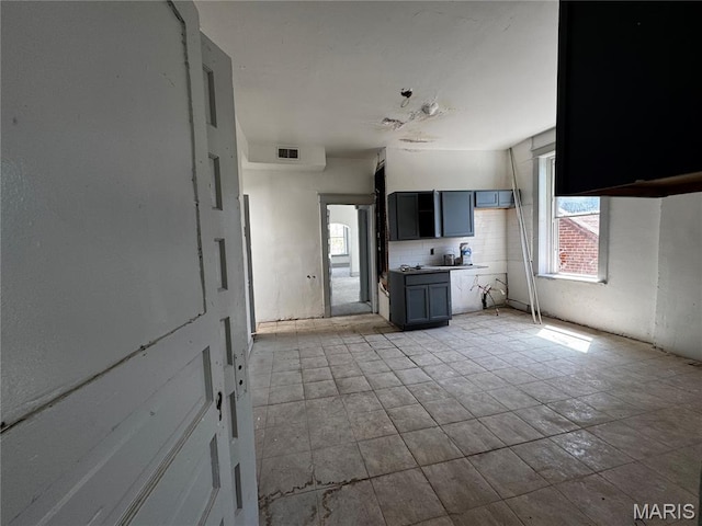 3929 Pennsylvania, Saint Louis, MO 63118 - unfurnished living room with healthy amount of natural light